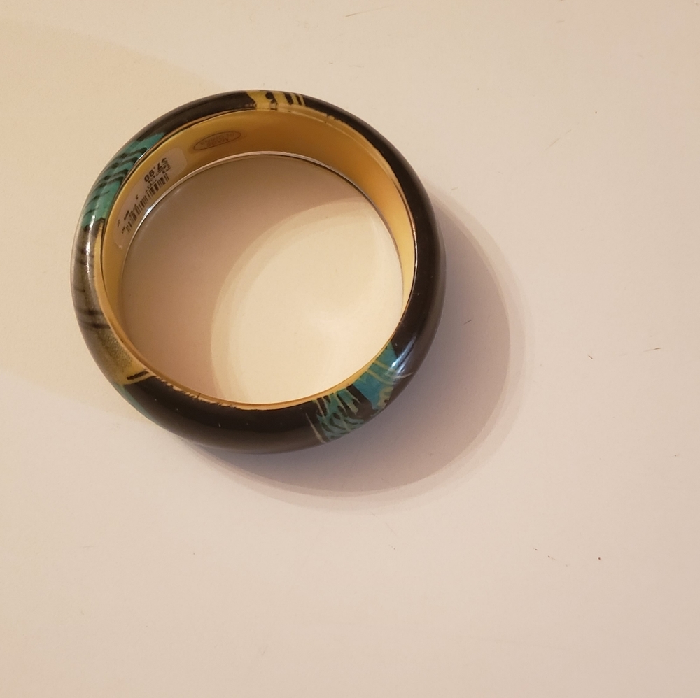 No name bangle bracelet.